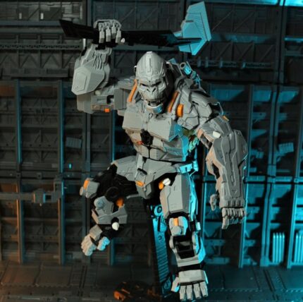 Robot figure posed with a weapon in industrial setting.