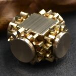 Gold metallic fidget cube with gears