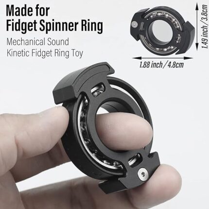 Black kinetic fidget spinner ring toy in hand.